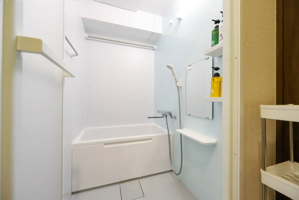 Bathroom with bathtub and shower