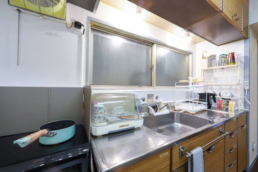Kitchen with induction stove and sink
