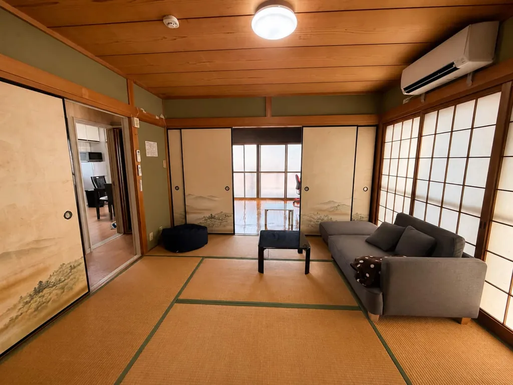 Japanese-style tatami room with sofa